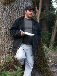 Bill Tripp, visionary and co-lead of the Western Klamath Restoration Partnership explains the ecology of tanoak trees in the Klamath Bioregion and their significance for food security in Karuk culture. Photo by M. Huffman/TNC.