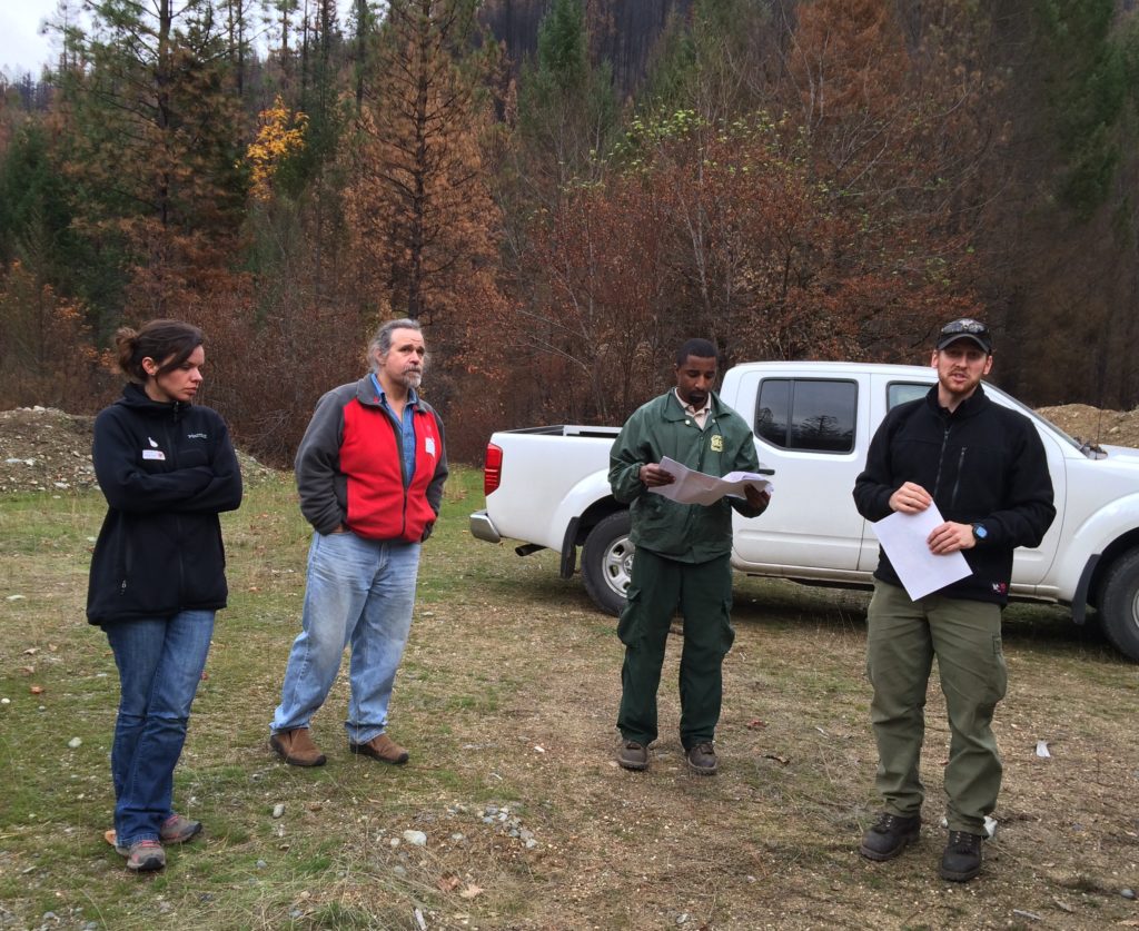 During an Open Standards field exercise, participants discuss shared values, threats, and strategies in the context of a recent wildfire. Photo by M. Huffman/TNC.
